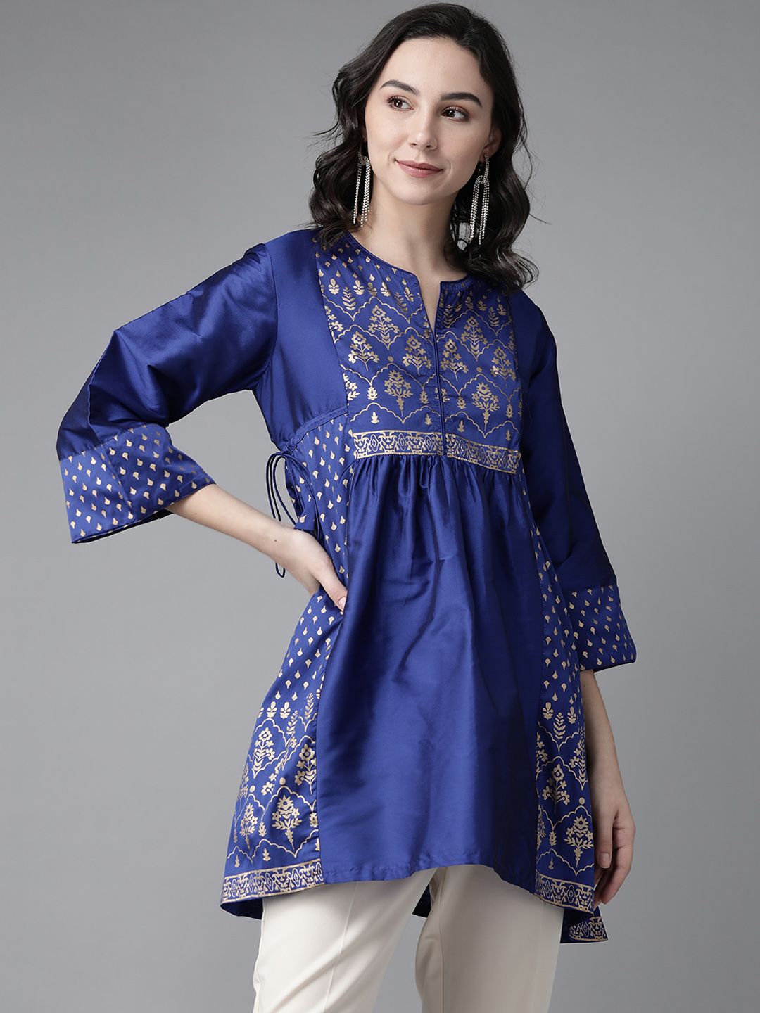 Bhama Couture Women Blue & Golden Silk Printed Tunic Price in India