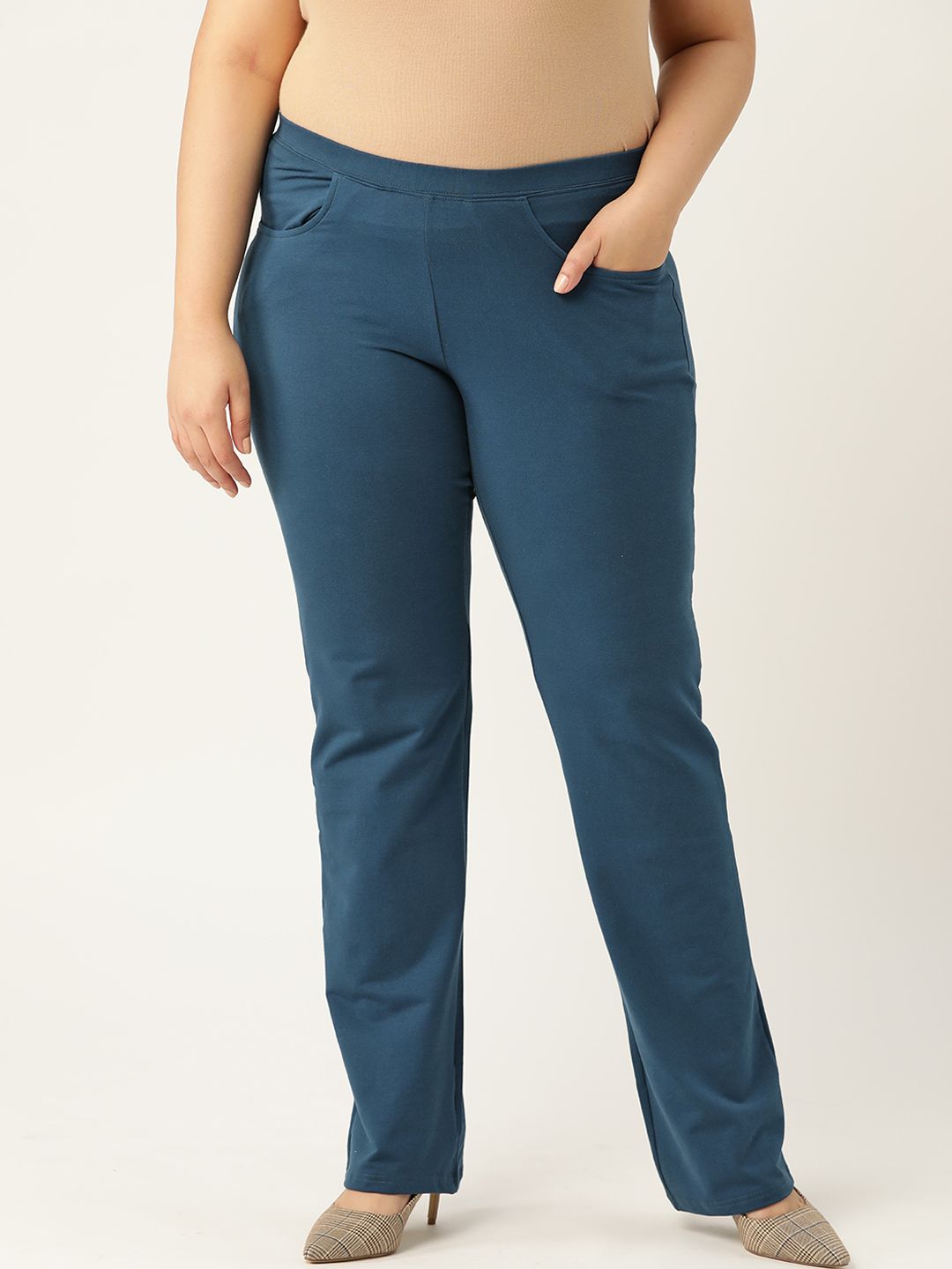 Revolution Plus Size Women Teal Blue Solid Relaxed High-Rise Regular Trousers Price in India