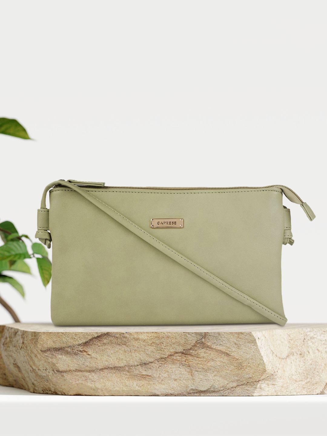 Caprese Green Leather Structured Sling Bag Price in India