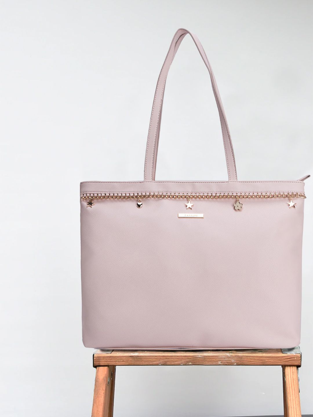 Caprese Pink PU Structured Shoulder Bag Price in India