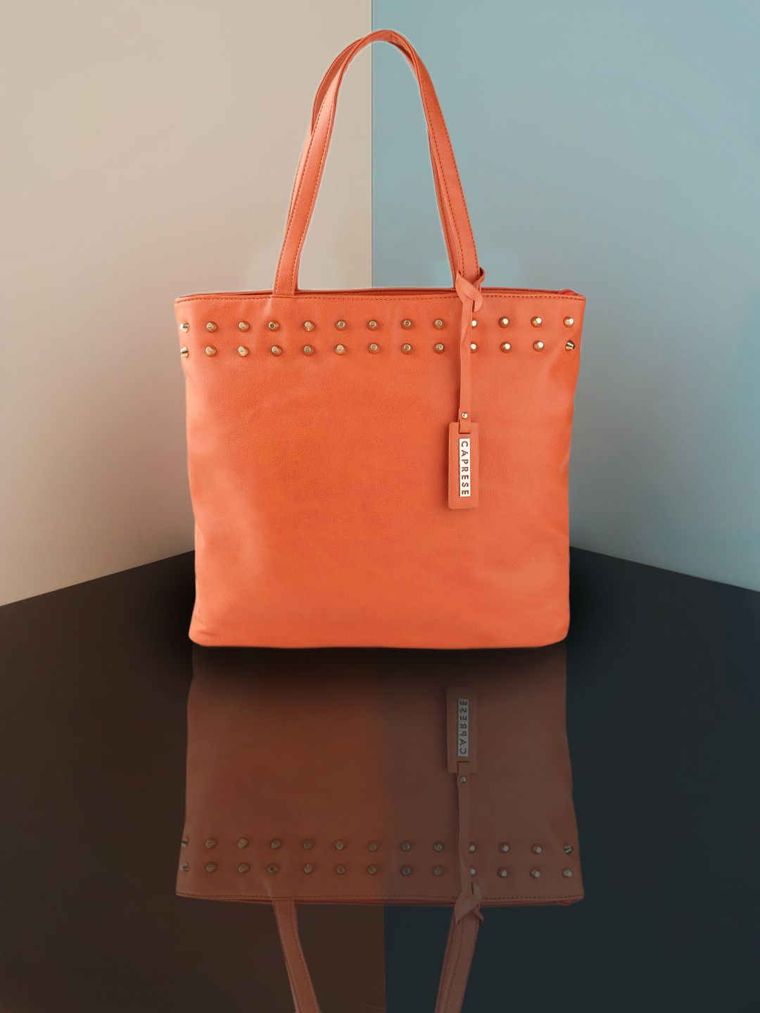 Caprese Women Orange & Gold-Toned Solid Studded RFID Shoulder Bag Price in India