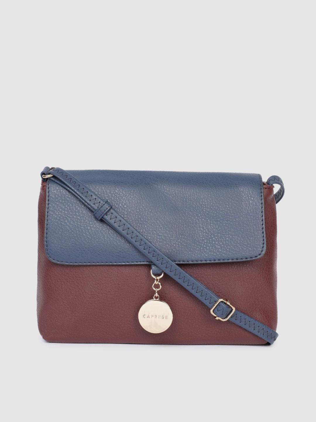 Caprese Women Blue & Maroon Colourblocked Leather Sling Bag Price in India