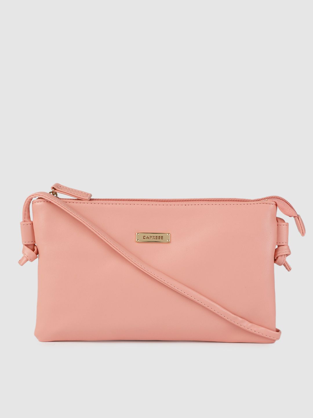 Caprese Pink Leather Structured Sling Bag Price in India
