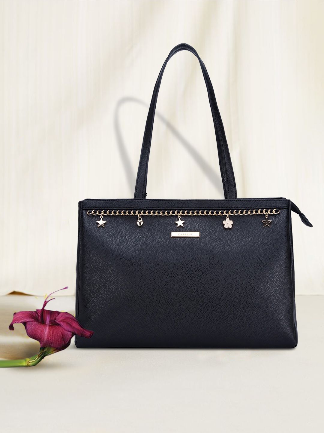 Caprese Women Black Solid Structured Shoulder Bag Price in India