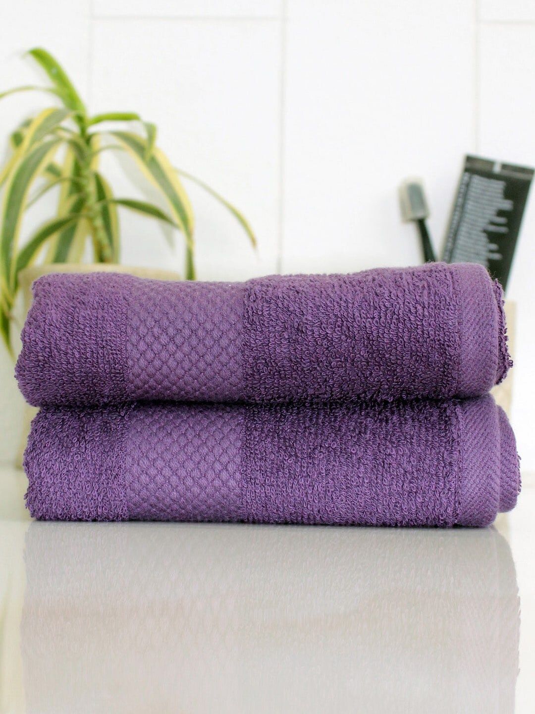AVI Living Set Of 2 Purple Cotton Solid 500 GSM Hand Towels Price in India