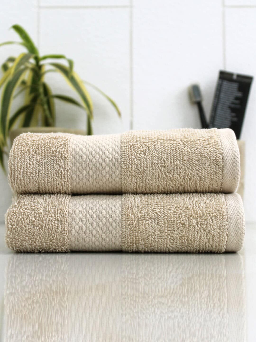 AVI Living Set Of 2 Beige Cotton Solid 500 GSM Hand Towels Price in India