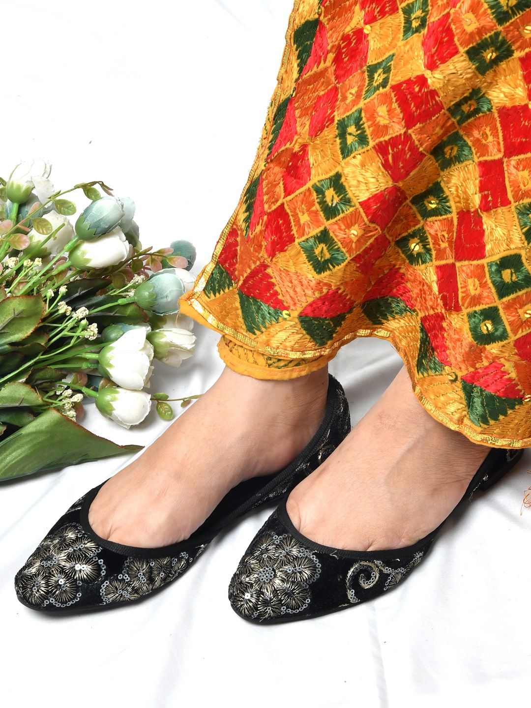 Zebba Women Black Woven Design Velvet Mojaris Price in India