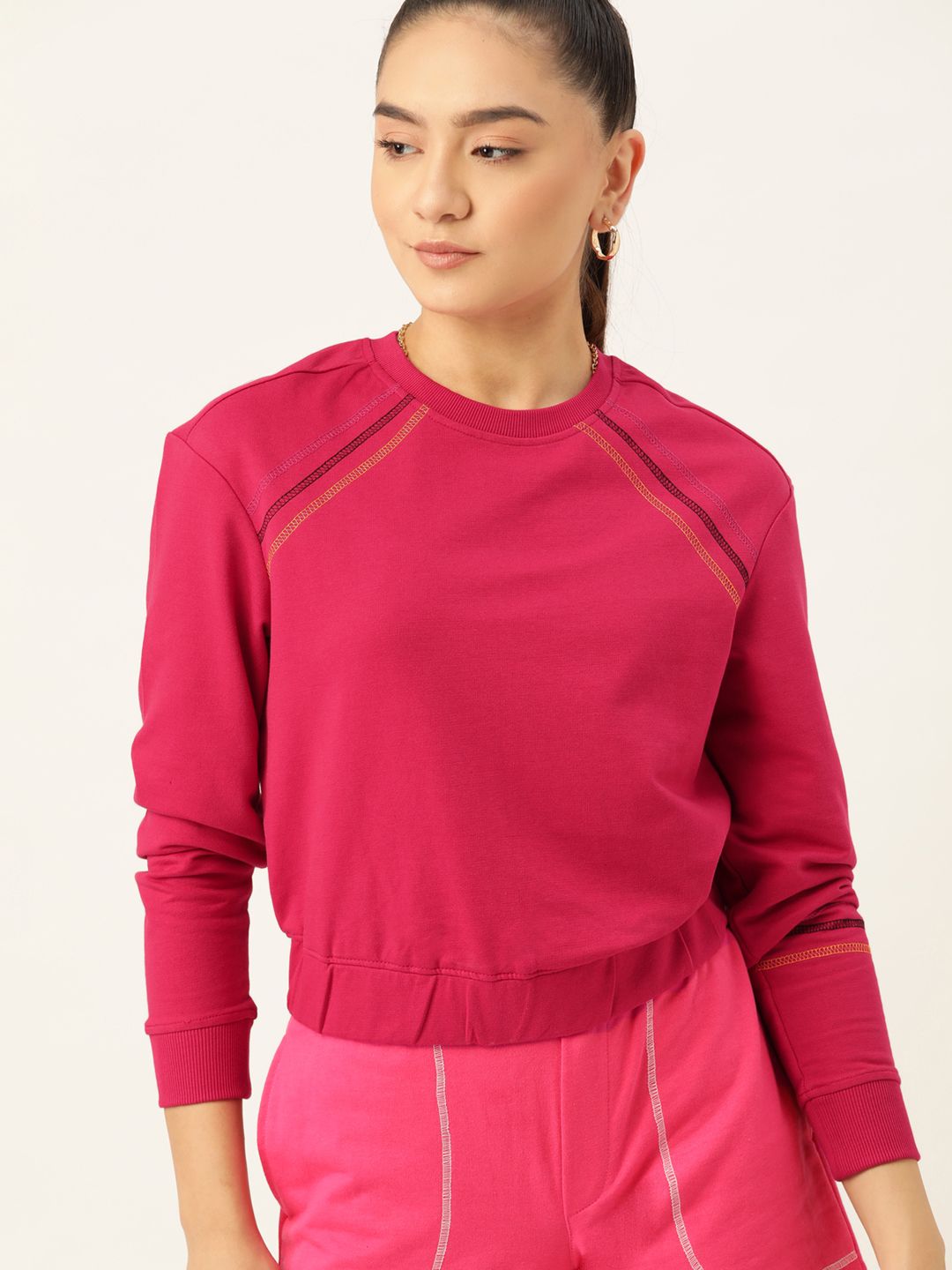 DressBerry Women Pink Solid Sweatshirt Price in India