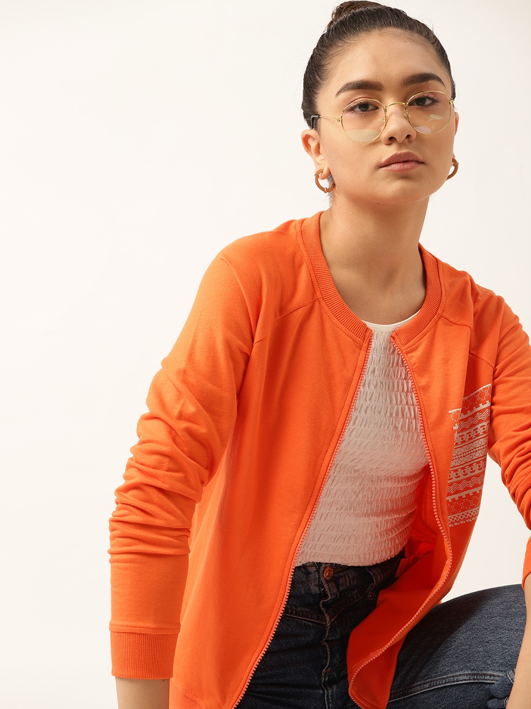 DressBerry Women Orange Solid Sweatshirt With Printed Detail Price in India
