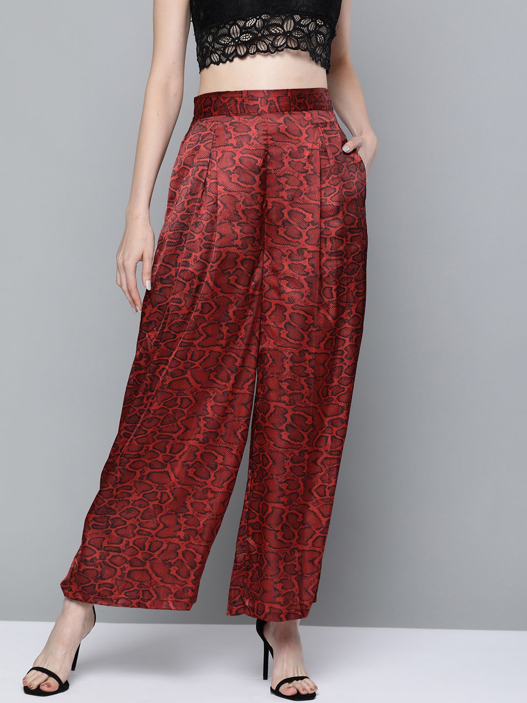 SASSAFRAS Women Red & Black Snake Skin Print Wide Leg Trousers Price in India