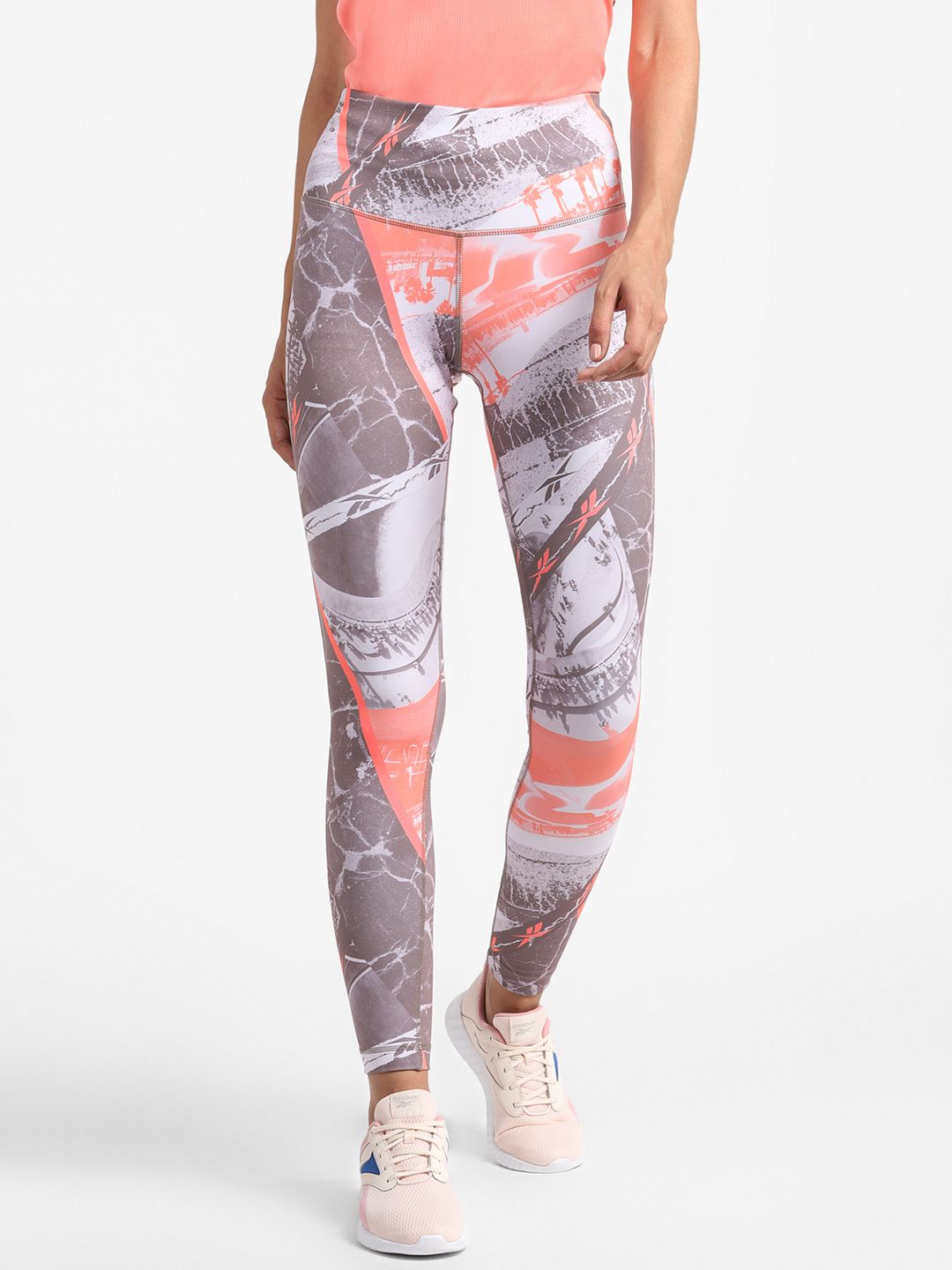 Reebok Women Peach-Coloured & Mauve All Over Print Sustainable Workout Tights Price in India