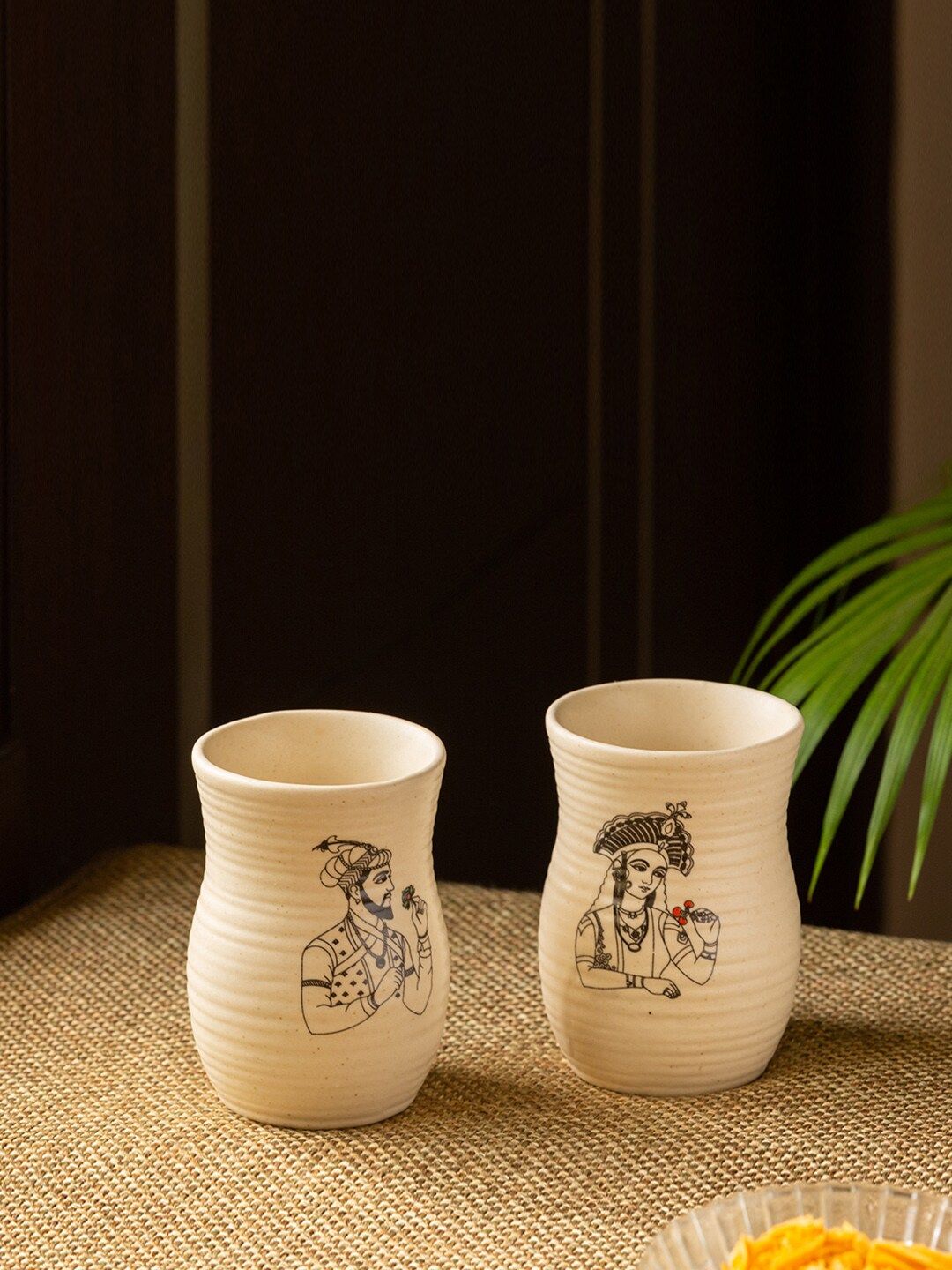 ExclusiveLane Cream-Coloured Black Set of 2 Printed Handcrafted Ceramic Tea & Milk Glasses Price in India