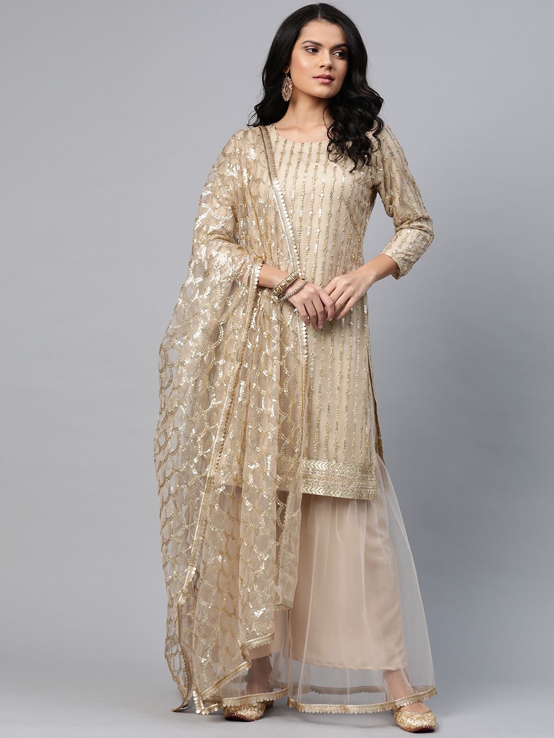 Readiprint Fashions Beige & Golden Embellished Semi-Stitched Dress Material Price in India