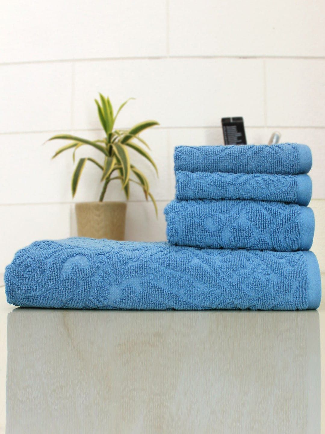 AVI Living Blue Set Of 4 Self Design 550 GSM Towel Set Price in India