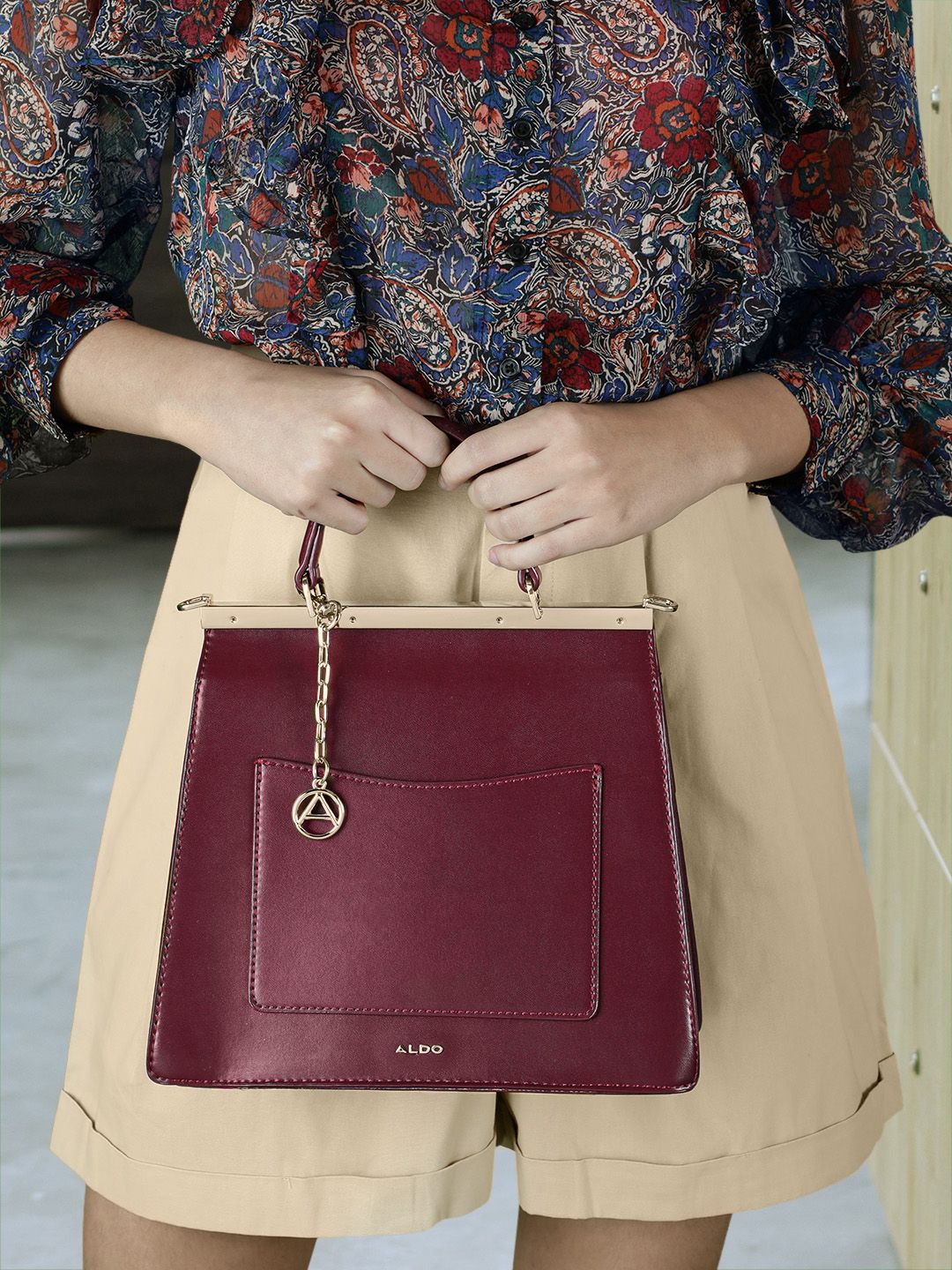 ALDO Burgundy Snakeskin Textured Satchel Price in India