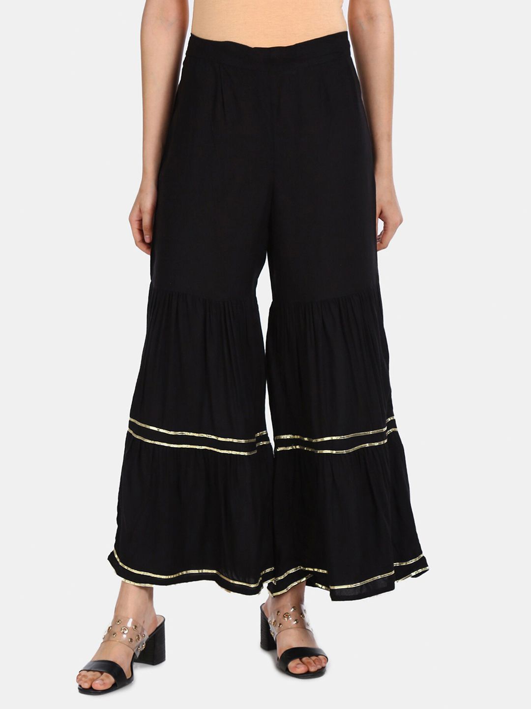 Anahi Women Black Solid Flared Palazzos Price in India