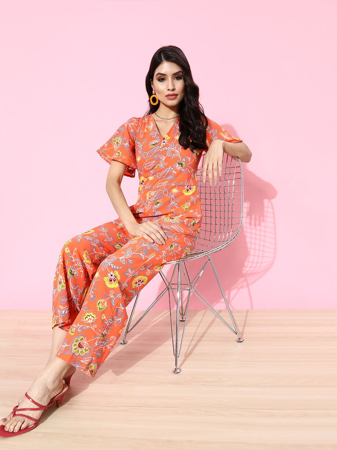 DressBerry Women Orange & Yellow Floral Print Basic Jumpsuit Price in India