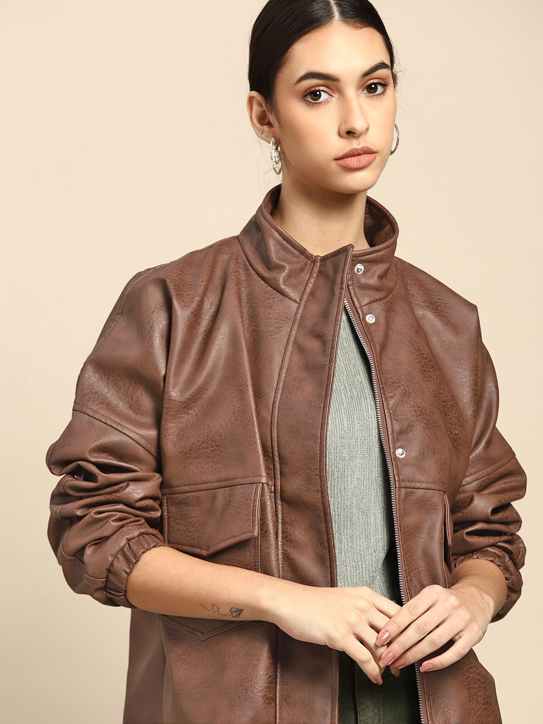 all about you Women Brown Solid Leather Jacket Price in India