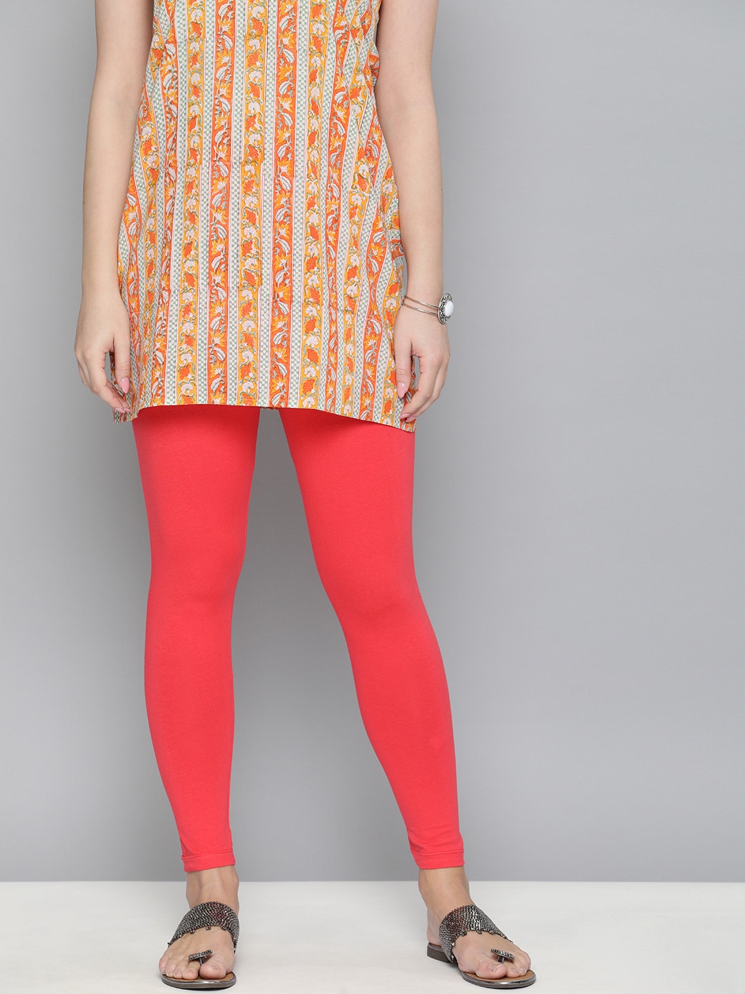 HERE&NOW Women Coral Pink Solid Ankle Length Leggings Price in India