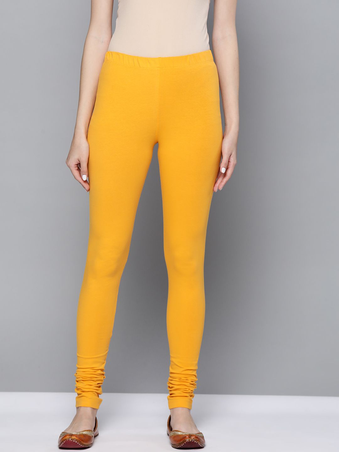 HERE&NOW Women Yellow Solid Leggings Price in India