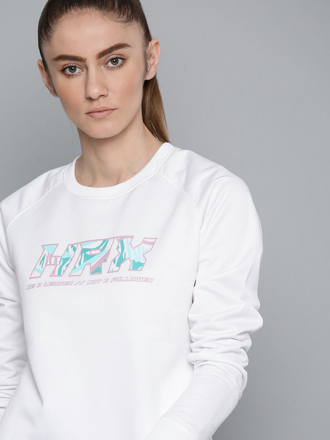 HRX By Hrithik Roshan Running Women Bright White Rapid-Dry Solid Sweatshirt Price in India