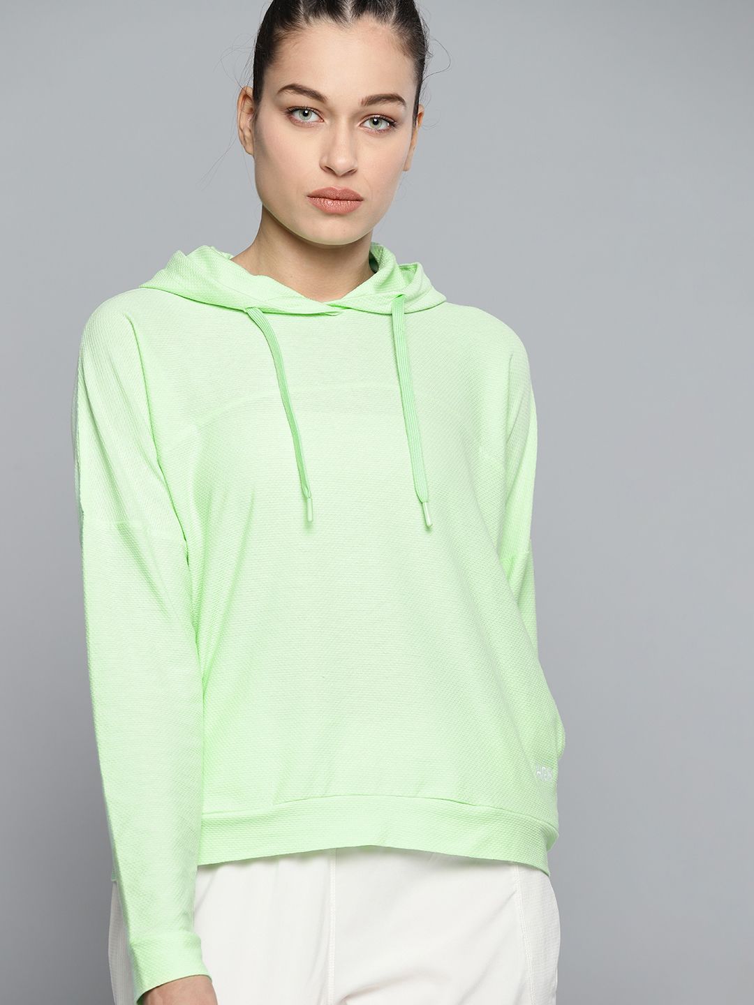 HRX By Hrithik Roshan Lifestyle Women Neo Mint Rapid-Dry Solid Sweatshirt Price in India
