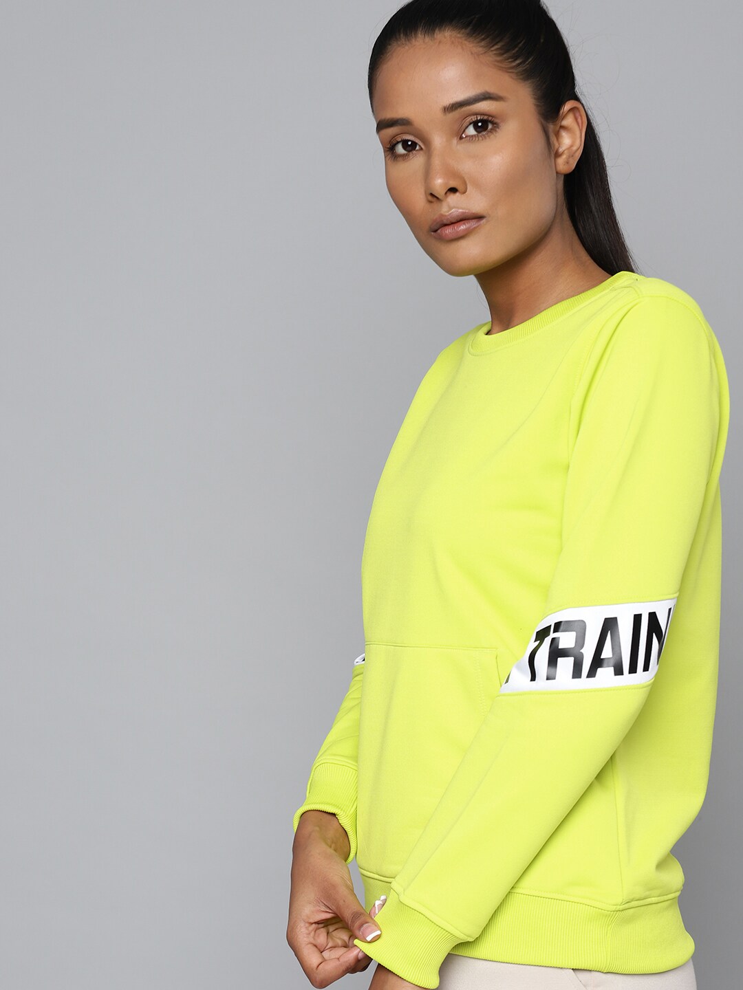 HRX By Hrithik Roshan Training Women Lime Punch Rapid-Dry Solid Sweatshirt Price in India