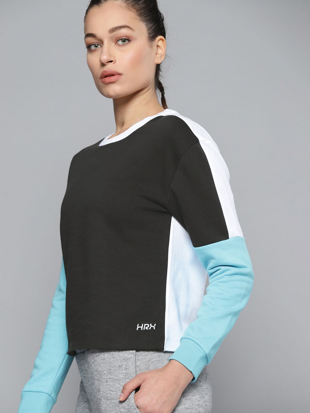 HRX By Hrithik Roshan Lifestyle Women Jet Black & White Rapid-Dry Colourblock Sweatshirt Price in India