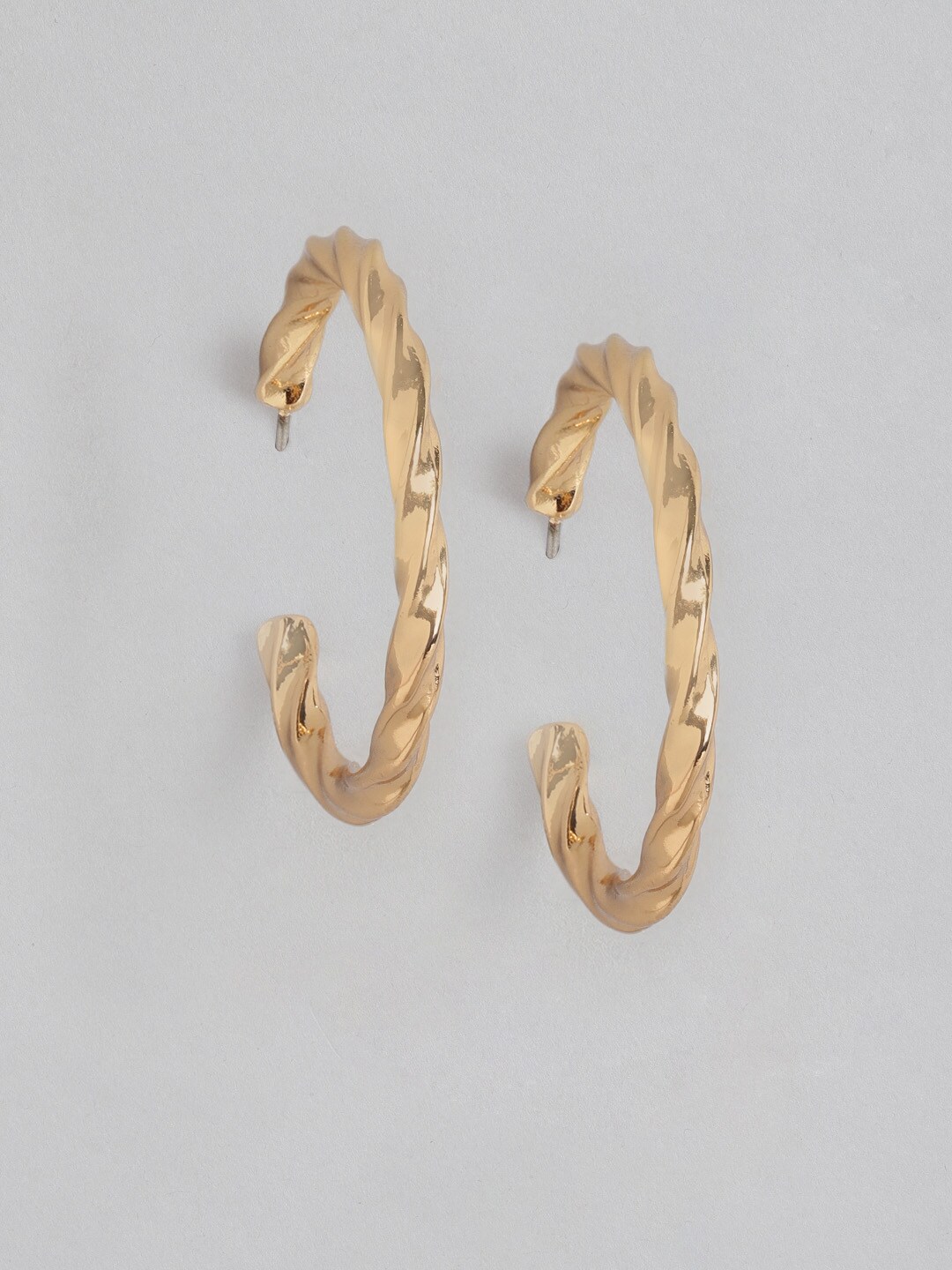 DressBerry Gold-Toned Twisted Crescent Shaped Half Hoop Earrings Price in India