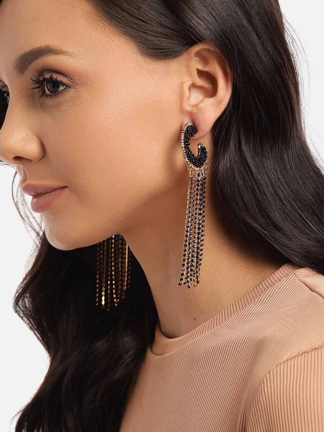 DressBerry Black & Gold-Toned Stone Studded Tasselled Crescent Shaped Drop Earrings Price in India