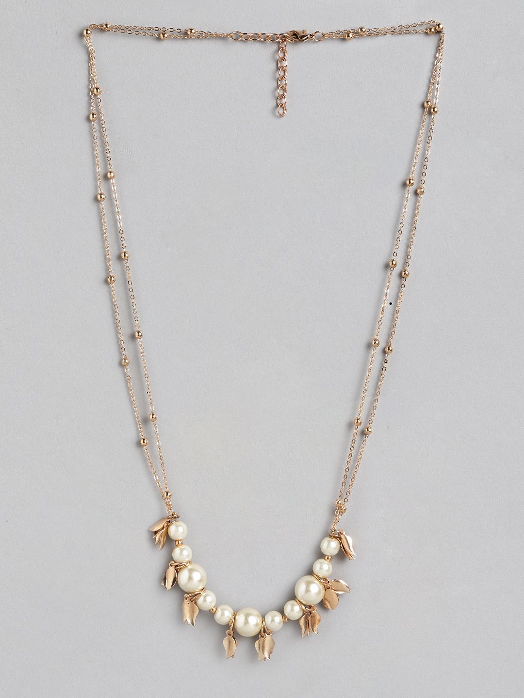 DressBerry Gold-Toned & Off-White Beaded Leaf Charm Dual Stranded Necklace Price in India