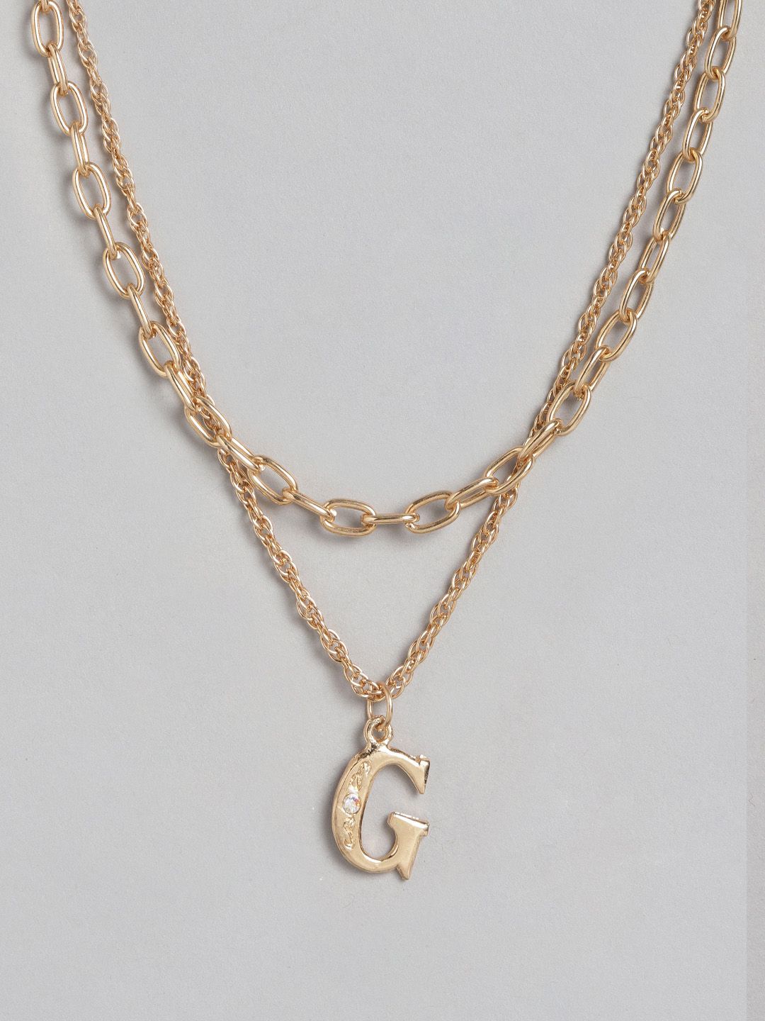 DressBerry Gold-Toned G-Alphabet Stone-Studded Layered Necklace Price in India