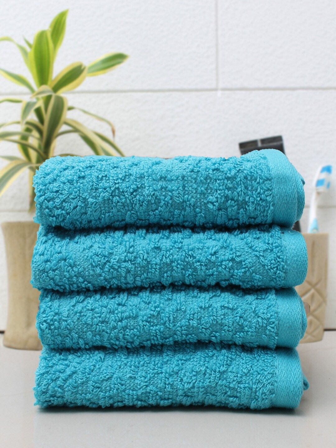 AVI Living Pack Of 4 Turquoise-Blue Solid 450GSM Cotton Hand Towels Price in India