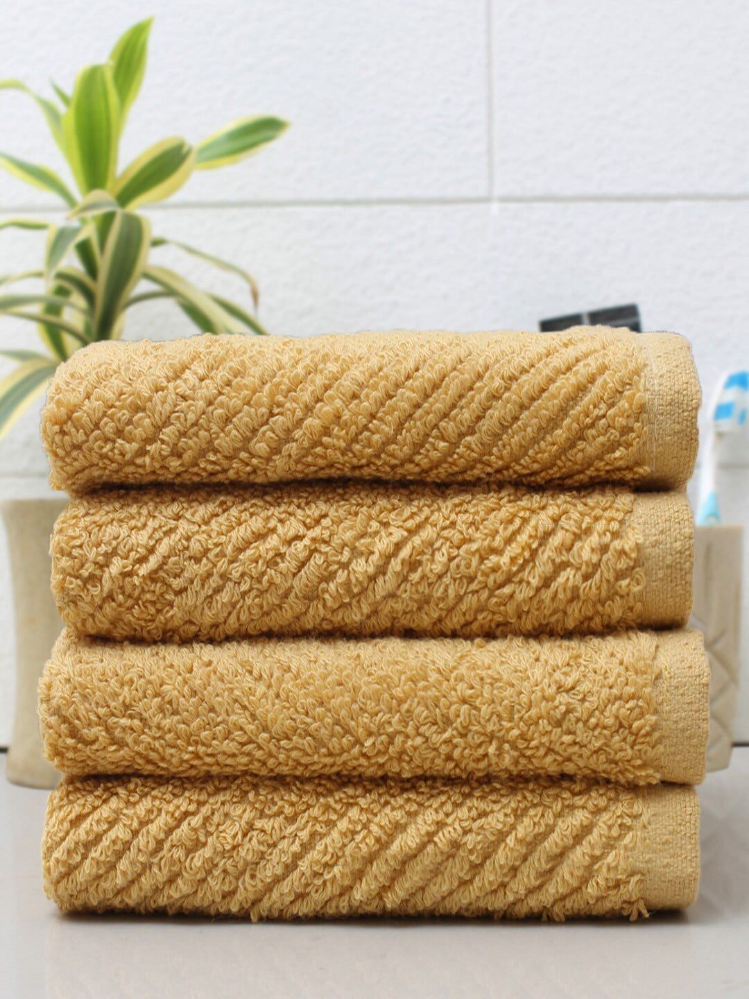 AVI Living Set Of 4 Yellow Solid 550GSM Cotton Hand Towels Price in India