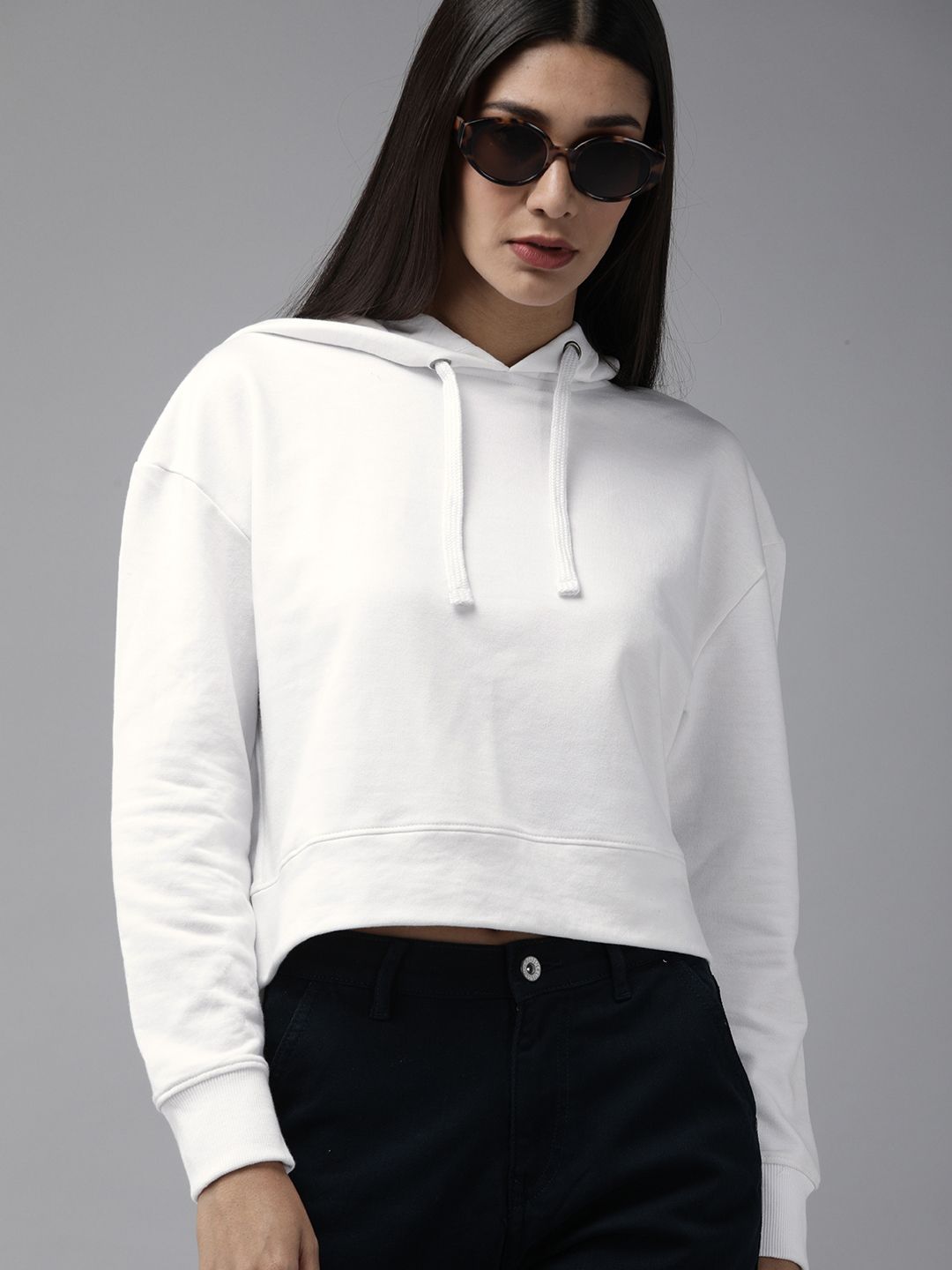 Roadster Women White Solid Boxy Fit Drop Shoulder Hooded Sweatshirt Price in India