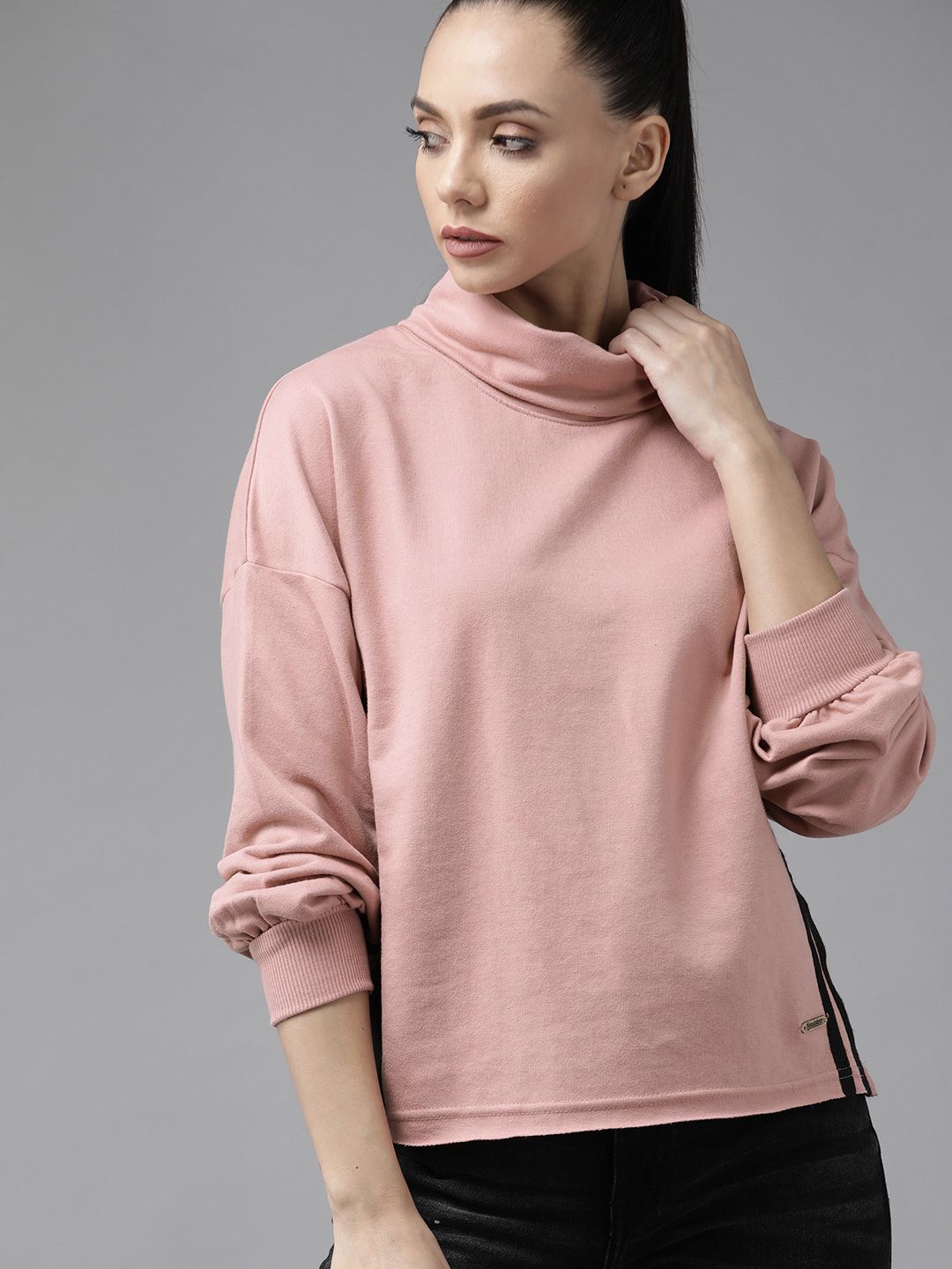 Roadster Women Pink Solid Sweatshirt with Contrast Side Taping Price in India