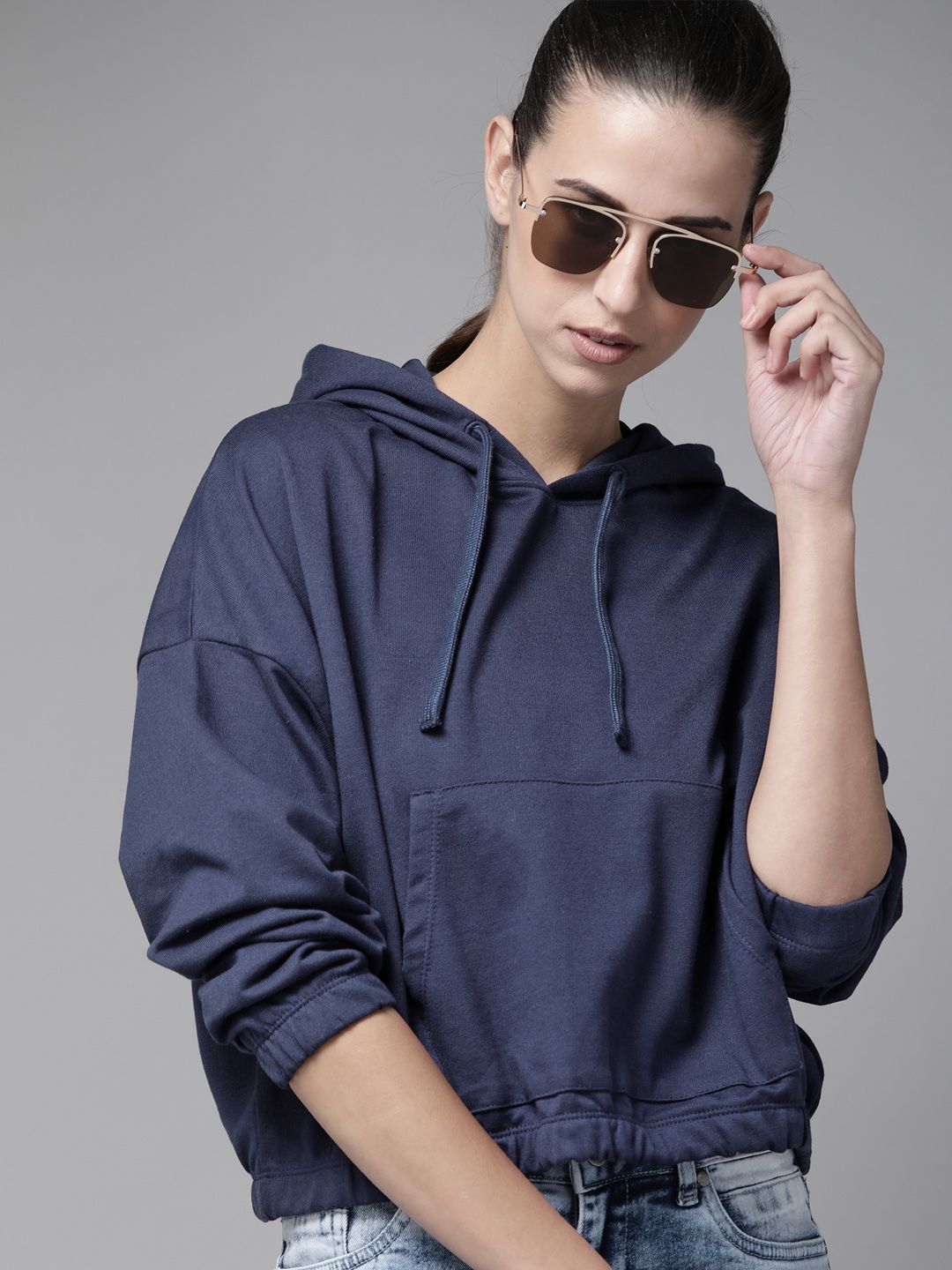 Roadster Women Navy Blue Solid Hooded Kangaroo Pocket Sweatshirt Price in India