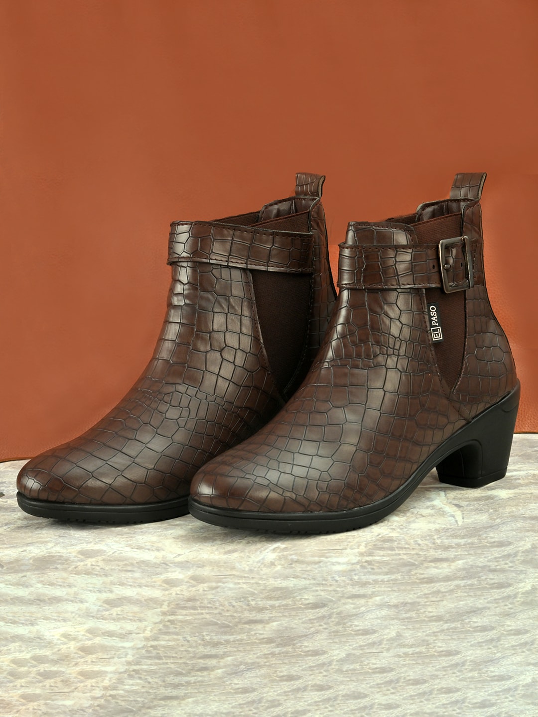 El Paso Brown Textured Block Heeled Boots Price in India