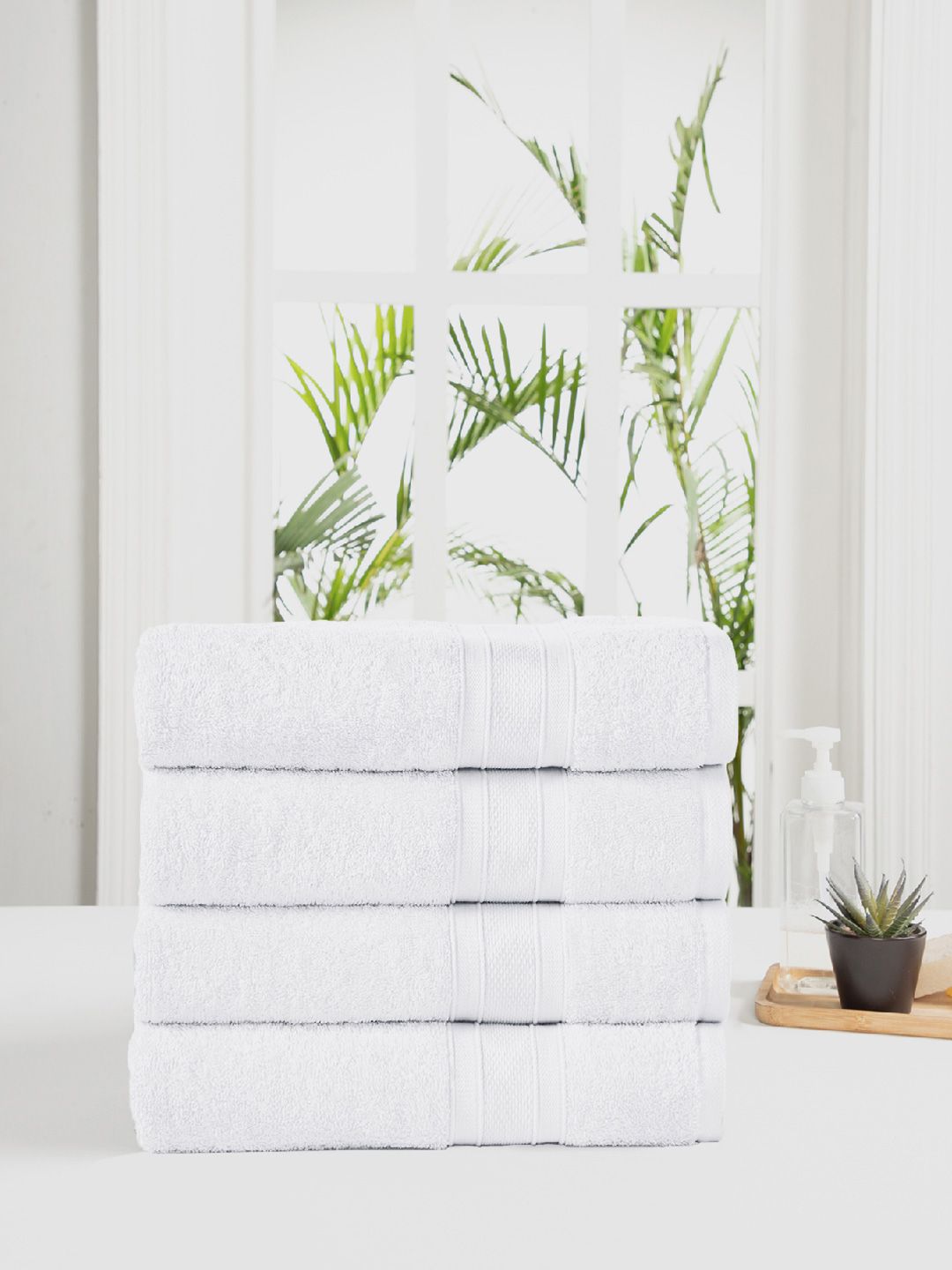 Trident Unisex Set of 4 White 500GSM Cotton Bath Towels Price in India