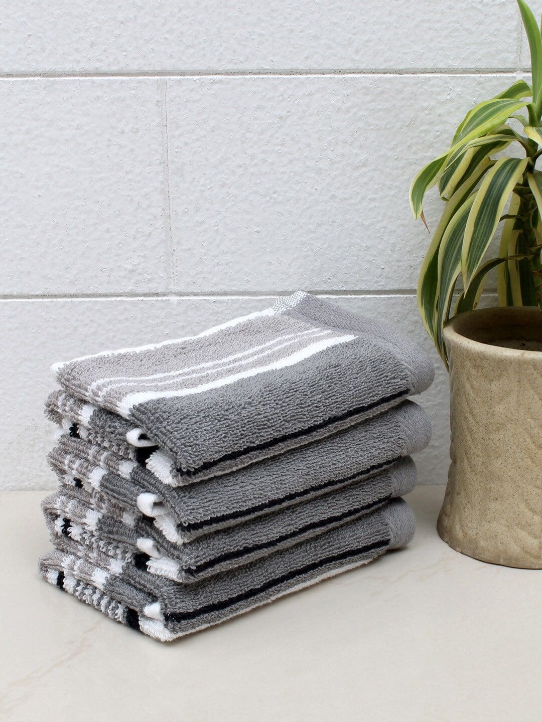 AVI Living Pack Of 4 Grey & White Striped 600 GSM Cotton Face Towels Price in India