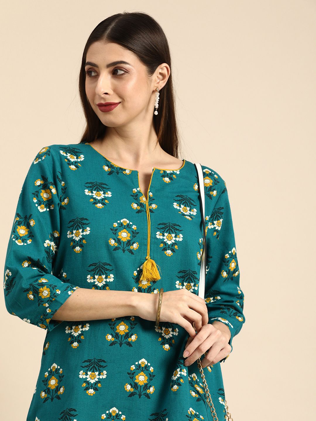 all about you Teal Blue Floral Printed Cotton Straight Kurti Price in India