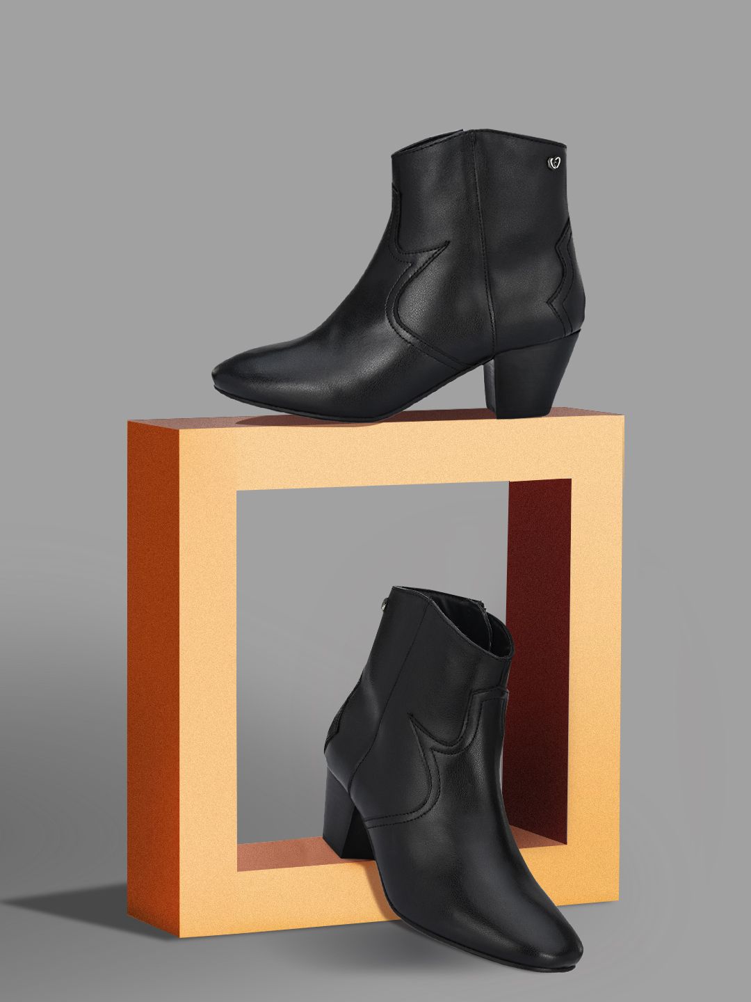 Delize Women Black Solid Heeled Boots Price in India