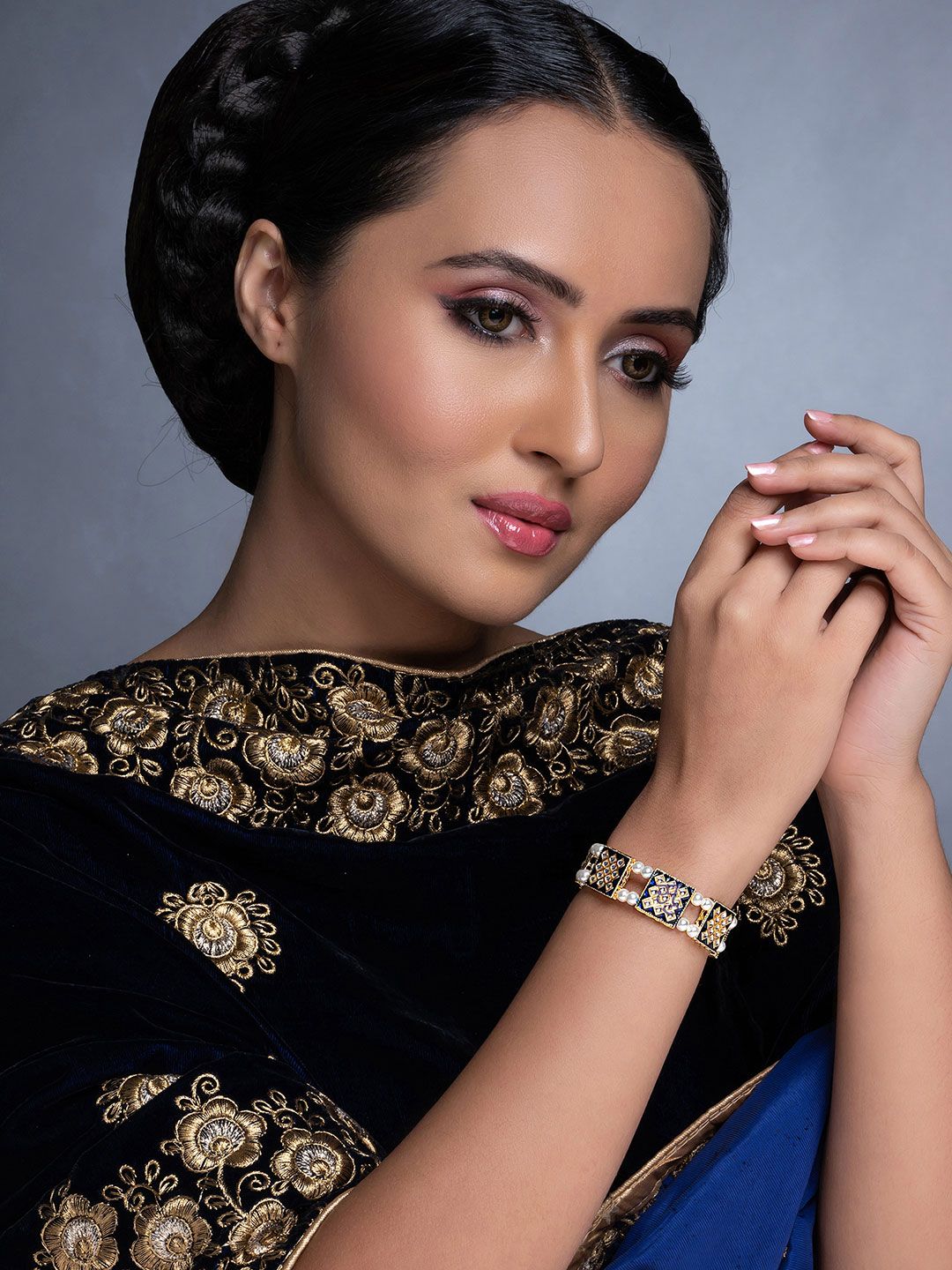 Sukkhi Women Gold & Blue Pearls Meenakari Gold-Plated Charm Bracelet Price in India
