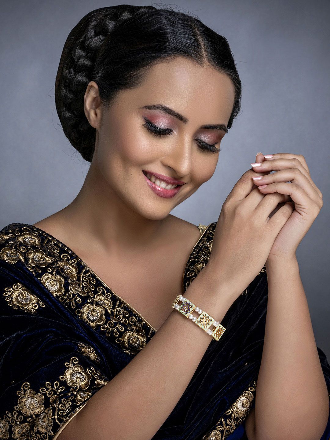 Sukkhi Women Gold-Plated & White Pearls Meenakari Gold-Plated Link Bracelet Price in India