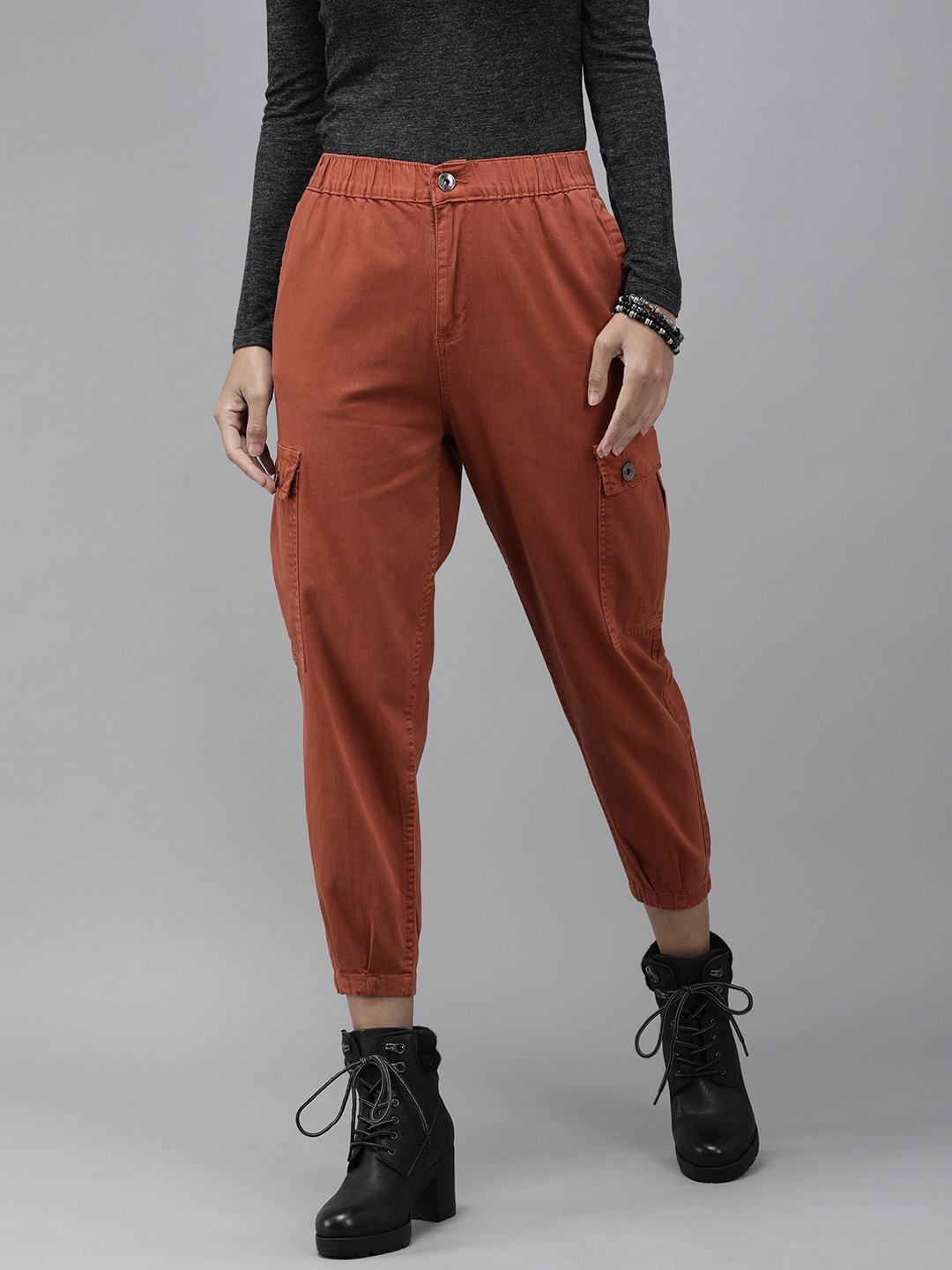 Roadster Women Rust Red Solid Regular Fit Mid-Rise Cargos Trousers Price in India