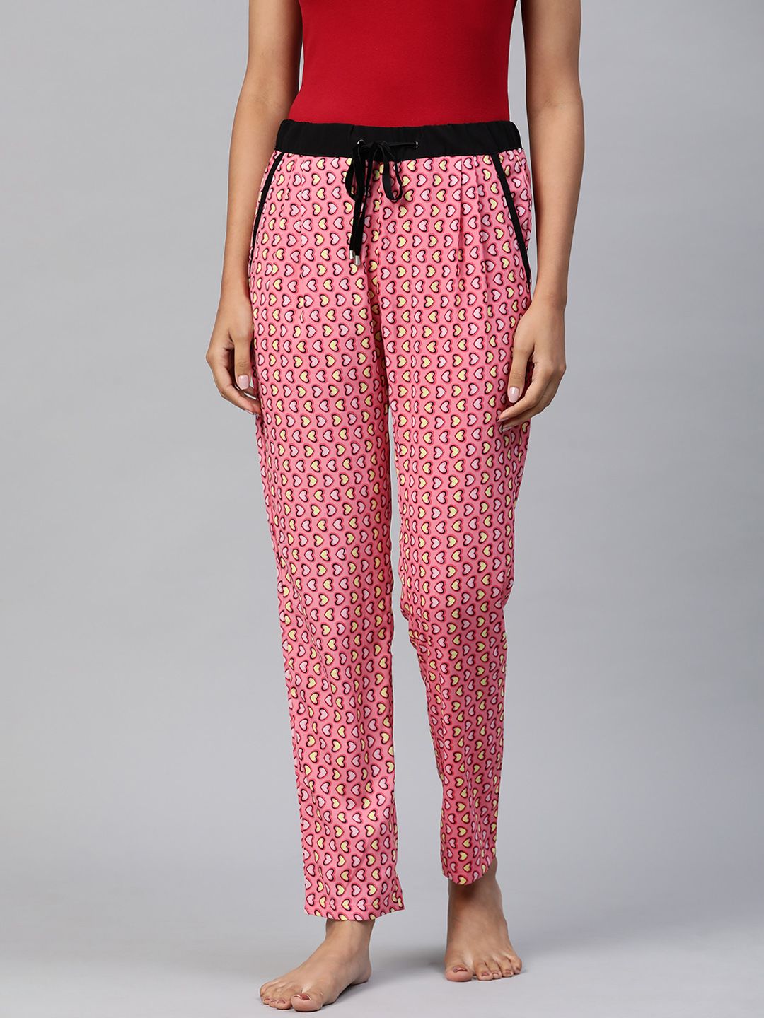 RIVI Women Pink & Yellow Heart Print Lounge Pants Price in India