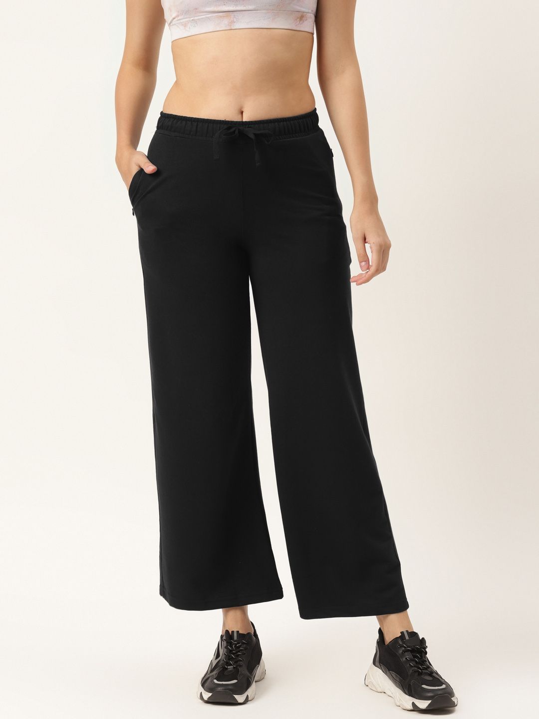 FEMEA Women Black Solid Wide Leg Bootcut Track Pants Price in India