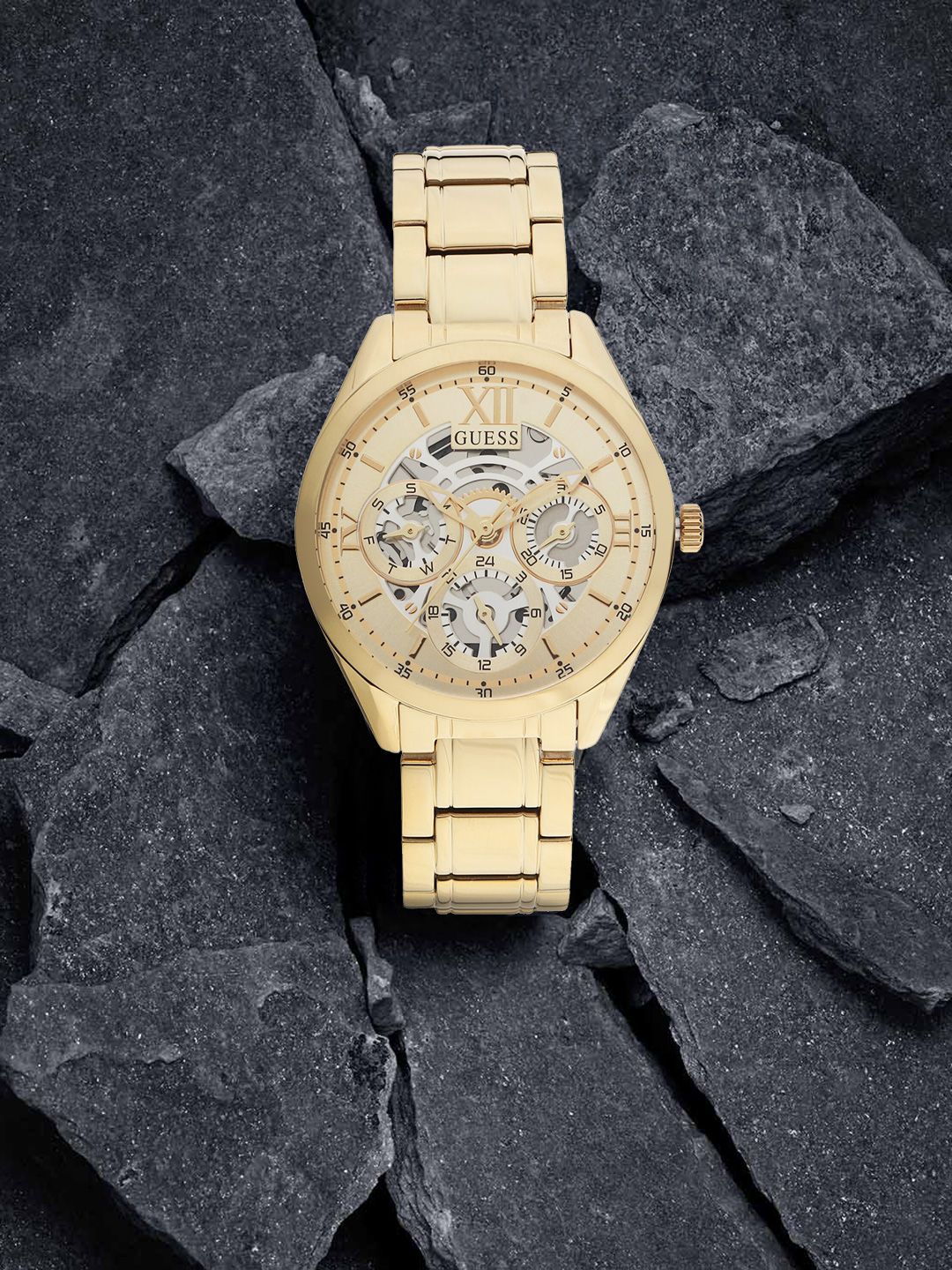 GUESS Women Gold-Toned Skeleton Dial Analogue Watch GW0253L2 Price in India