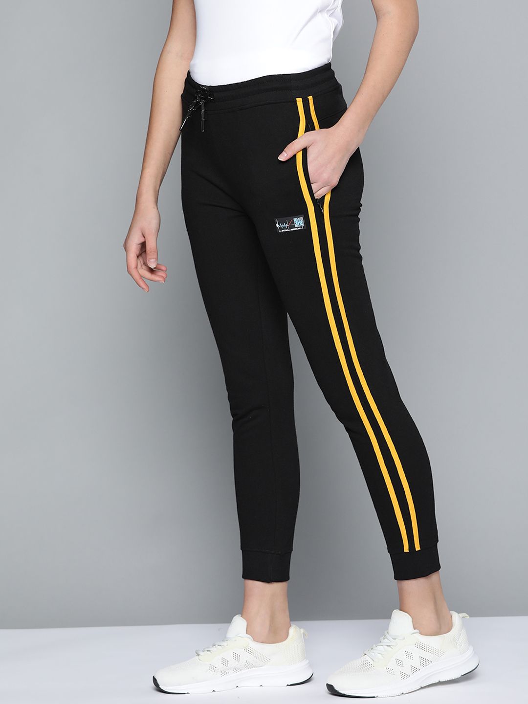 HRX By Hrithik Roshan Lifestyle Women Jet Black Bio-Wash Solid Joggers Price in India