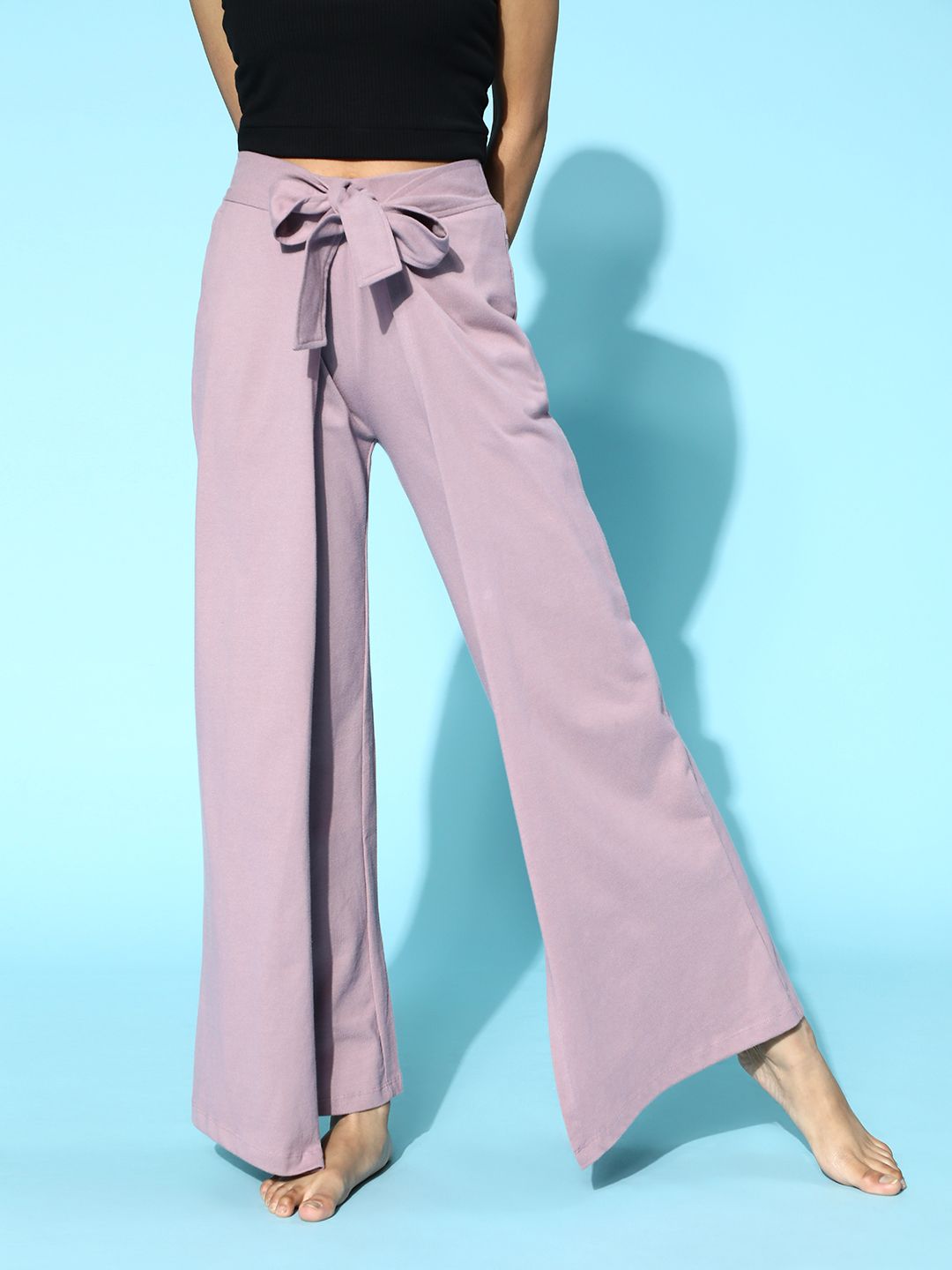 HRX by Hrithik Roshan Women Elegant Lavender Solid Kick Flared Track Pants Price in India